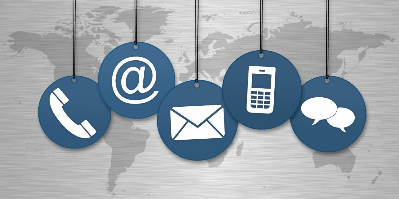 Contact icons over world map.